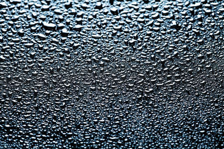 Water drops abstract dark backgroundの写真素材