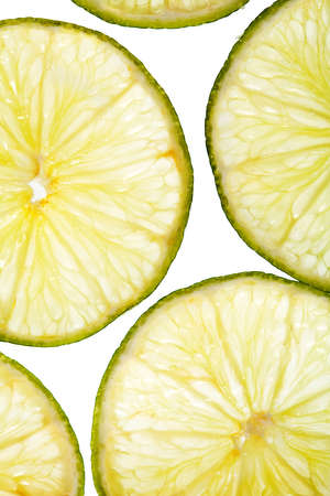 Citrus slices fresh fruit yellow green background