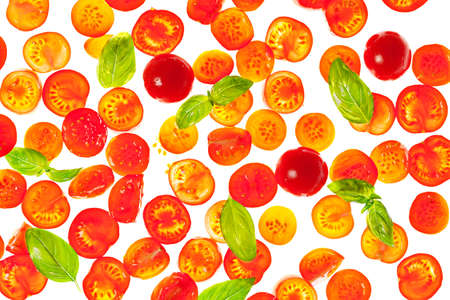 Sliced red fresh tomato isolated food backgroundの写真素材