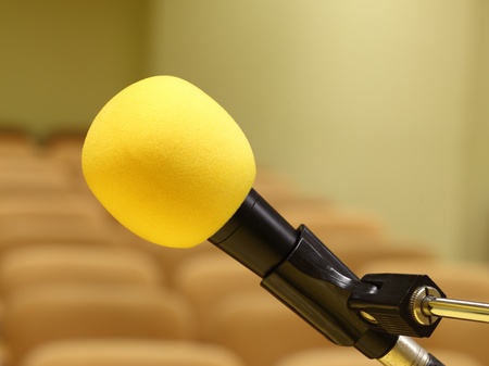 Microphone at conference - rows of empty seats texture の写真素材