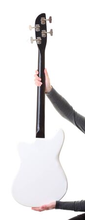 in hand  electrical bass guitar isolated on whiteの写真素材