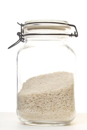natural rice in jar on white backgroundの写真素材