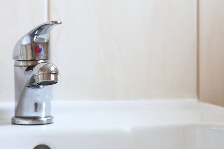 Bathroom interior with white sink and faucet - mixer tap の写真素材