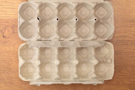 empty eggs box on tableの写真素材