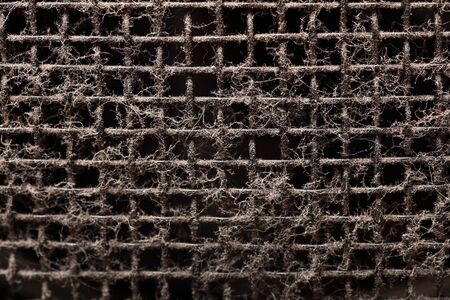 Black Old grungy speaker holes. Texture. Dusty.の写真素材