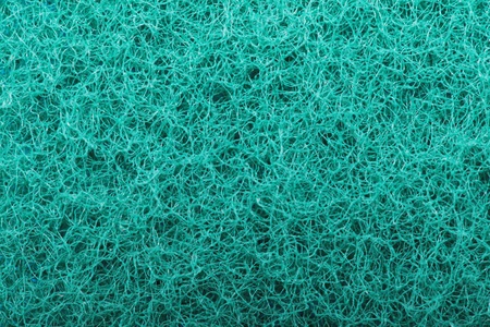 Green abrasive sponge texture backgroundの写真素材
