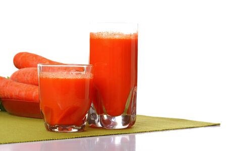 Juice and carrot isolated white kitchen prepareの写真素材
