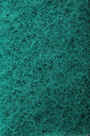 Green abrasive sponge texture backgroundの写真素材
