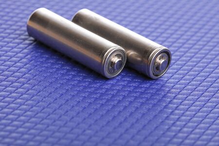 battery Energy supply equipment on blue backgroundの写真素材