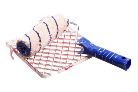 old dirty paint roller isolated on white backgroundの写真素材