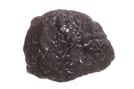 Piece coal isolated over white backgroundの写真素材