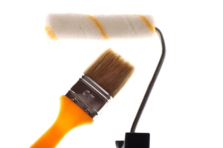 Paintbrush yellow over white isolated backgroundの写真素材