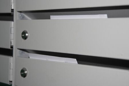 payment papers in gray iron mailboxesの写真素材