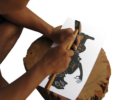 Training make shadow play puppet step that to drive a wedge into paperの写真素材