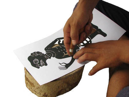 Training make shadow play puppet step to cut off paperの写真素材