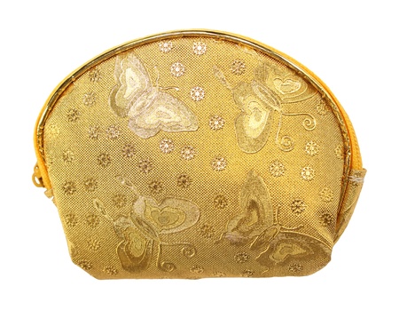 Golden fabric wallet for coins isolated on white backgroundの写真素材