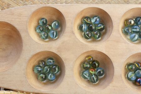 Mancala (or Wari) a classic board game in Thailandの写真素材