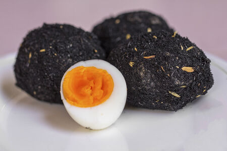 Preserved salted duck eggs with chaff and ashes - Thai recipeの写真素材