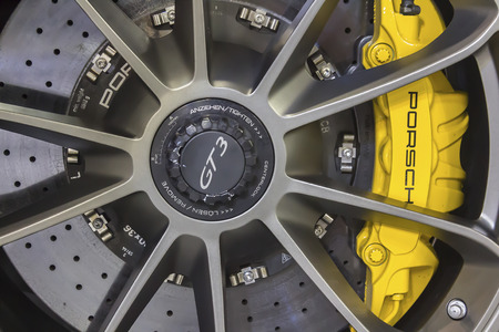 BANGKOK - APRIL 2: Porsche wheel on display at The 35th Bangkok International Motor Show on April 2, 2014 in Bangkok, Thailand.のeditorial素材