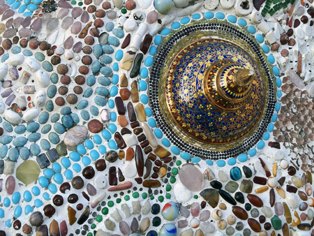 PHETCHABUN ,THAILAND - JANUARY 4 : Colorful ceramic pattern decoration with pebbles made from pebble and ceramic on the wall at Wat Phasornkaew on January 4, 2015 in Phetchabun, Thailand.のeditorial素材
