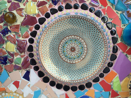 PHETCHABUN ,THAILAND - JANUARY 4 : Colorful ceramic pattern decoration with pebbles made from pebble and ceramic on the wall at Wat Phasornkaew on January 4, 2015 in Phetchabun, Thailand.のeditorial素材