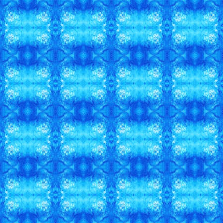 Abstract kaleidoscopic texture or background pattern design made from blue sky with cloudの写真素材