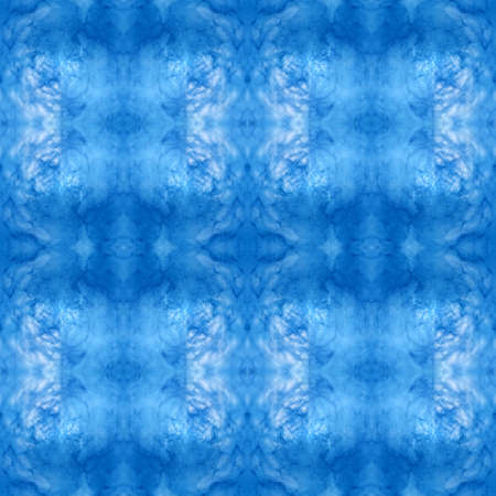Abstract kaleidoscopic texture or background pattern design made from blue sky with cloud