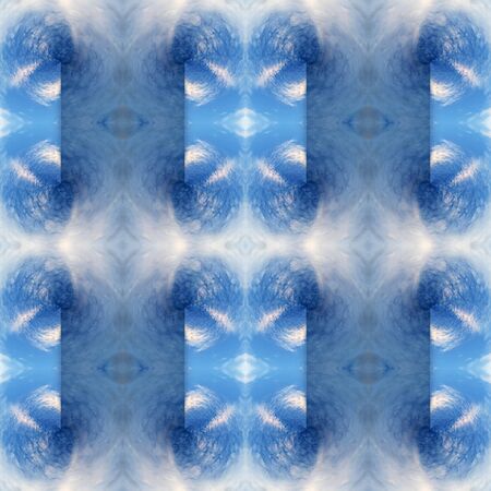 Abstract kaleidoscopic texture or background pattern design made from blue sky with cloud
