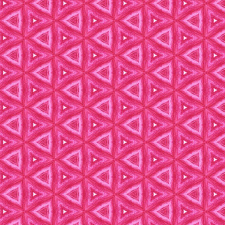 Abstract kaleidoscopic texture or background pattern design made from pink fabric