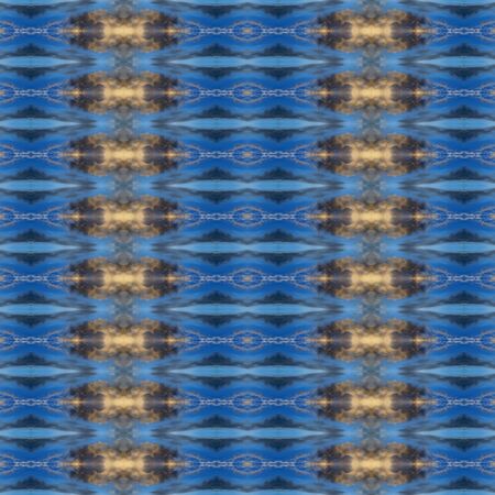 Abstract kaleidoscopic texture or background pattern design made from blue sky with cloud