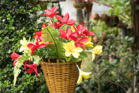 Artificial flowers plant decorated outdoorの写真素材