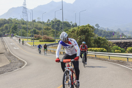 SURAT THANI, THAILAND - FEBRUARY 1: Cyclists compete in the Khao Sok marathon on February 1, 2015 in Surat Thani, Thailand.のeditorial素材