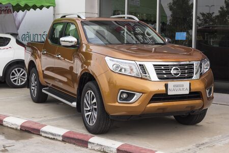 SURATTHANI, THAILAND - DECEMBER 22: New Nissan Navara NP 300 car on display at Chaiya Tescolotus department store on December 22, 2014 in Suratthani, Thailand.のeditorial素材