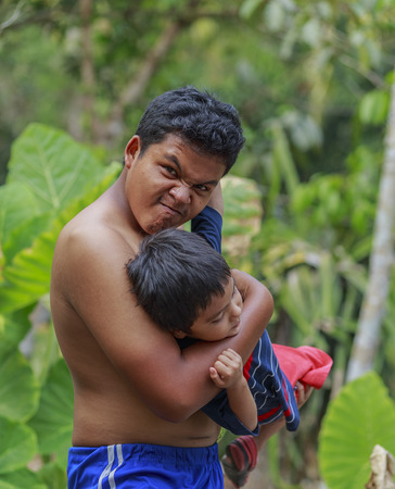 Asian teen man kidnap little boy, Child abductionの写真素材