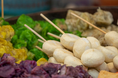 Dumplings with meat and vegetables at the street food market, fresh and healthy foodの写真素材