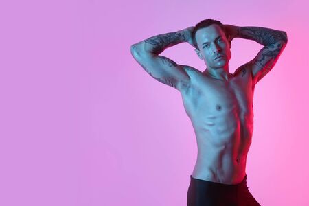 Portrait of sporty sexy man with perfect muscular body, naked torsoの写真素材