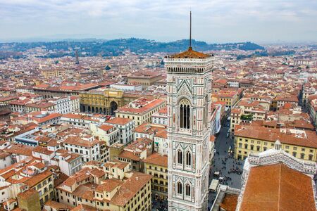 View of the bell tower of the basilica of Santa Maria in Fiore from the dome, Florence, Italyの写真素材