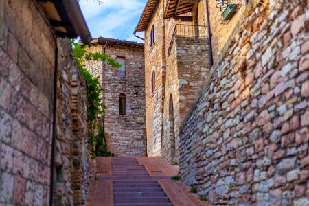 Stairway street in the ancient village of Assisi, Umbria, Italyの写真素材