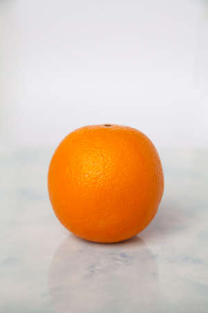 Orange fruit isolated on whiteの写真素材