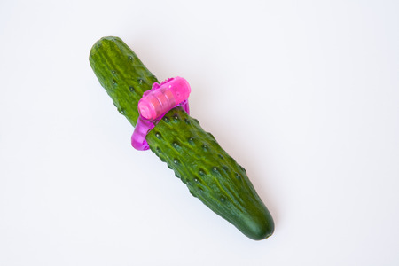 Sex toy and cucumber isolated on white backgroundの写真素材