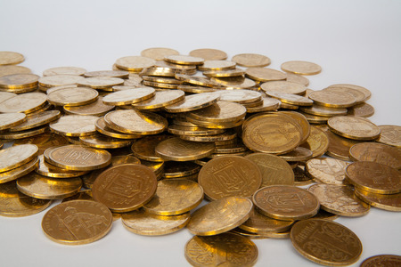 coins of Ukrainian hryvnias on white backgroundの写真素材