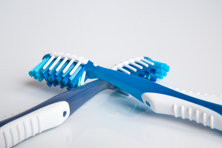 beautiful and a new toothbrush in the studio on a white background