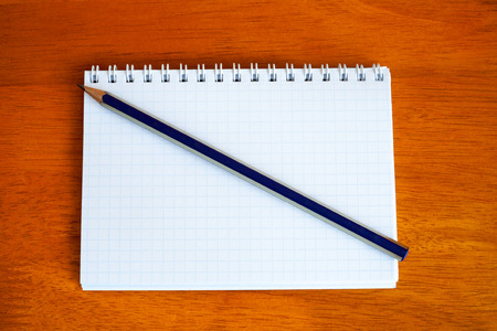 pencil on a notebook