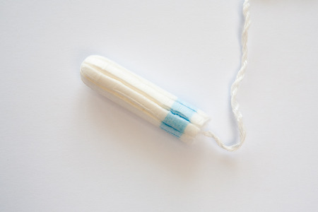 Woman hygiene protection, close-up.menstruation calendar with cotton tamponsの写真素材