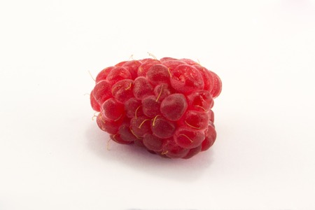 tasty and juicy red raspberries isolated on white background
