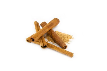 Cinnamon sticks on white background. Top viewの写真素材