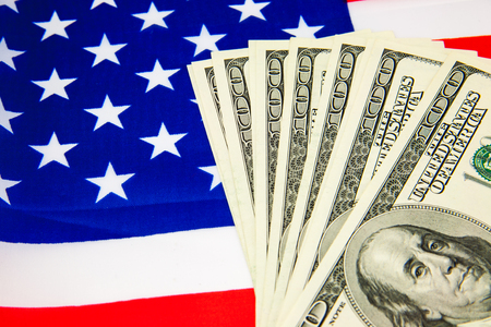 American dollars and flag. Stock images. Top.