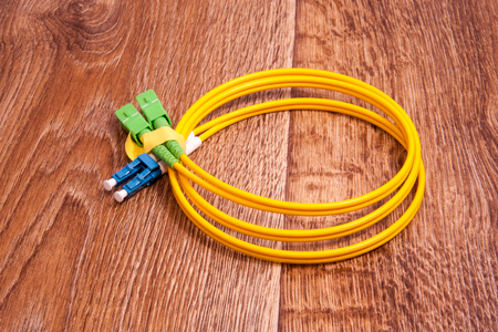 fiber optic patch cord on vintage background