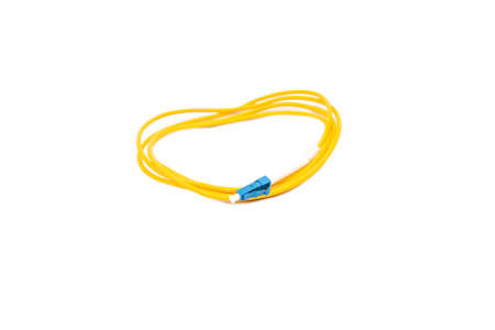 Yellow fiber optic cable isolated on white background