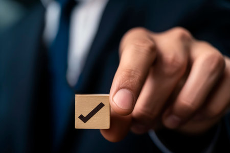 A man's hand in a suit shows a figure, an element on a gray background. Request, bankruptcy concept, close-upの素材